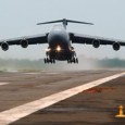 A C-152 and a C-5 mixing it up A C-152 and a C-5 were mixing it up in a local landing pattern. The little Cessna was on short final with the Galaxy screaming up from behind. Tower, concerned...