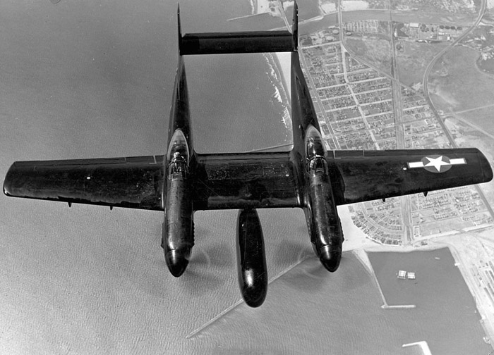 P-82 in black night fighter motif. Note the large bulge that carries the radar array under the wing