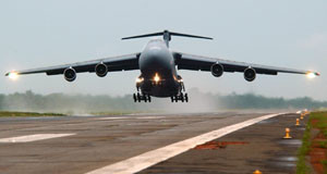 A C-152 and a C-5 mixing it up