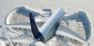 Grounded Plane Makes Snow Angel On Tarmac