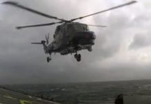 Lynx Helicopter Landing On Ship In Rough Sea