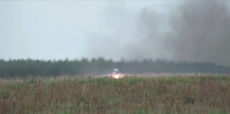 MiG-29 wet runway takeoff with full afterburners!