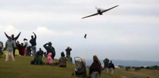 Low Flying Warbird Says Hello To The Crowd