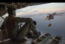KC-130J Hercules Refueling CH-53E With a Humvee Load