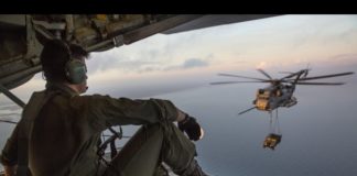 KC-130J Hercules Refueling CH-53E With a Humvee Load