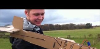 Two guys are delighted that their cardboard RC plane actually flies