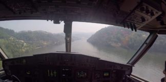 Waterbomber scooping water on Rio Douro