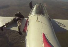 Watch This Aircraft Rolling With a Man Holding to the Edge of Its Wing