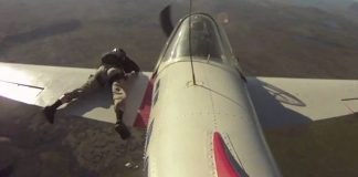 Watch This Aircraft Rolling With a Man Holding to the Edge of Its Wing