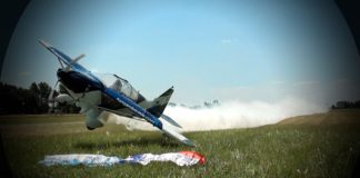 Snagging Flags Of The Ground With An Airplane… On Purpose…