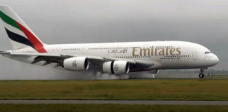 A380 FULL thrust reverse on a wet runway.