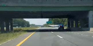 Plane Landing on a Sunrise Highway
