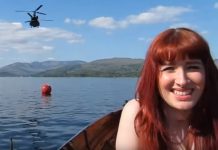 Two Chinook helicopters flying low over a lake Crazy Chinook Helicoptor Flyby