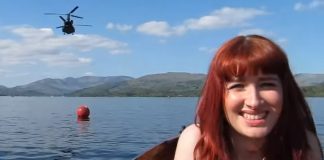 Two Chinook helicopters flying low over a lake Crazy Chinook Helicoptor Flyby