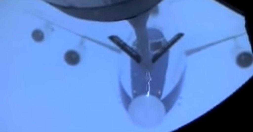 USAF KC-135 aircraft is preparing to refuel a USAF E-4 aircraft. The weather that they were going through causes the differential static equalization between the two aircraft.
