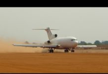 Mighty Boeing 727 landing on dirt airstrip