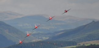 RAF Red Arrows transit in Formation through Mach Loop