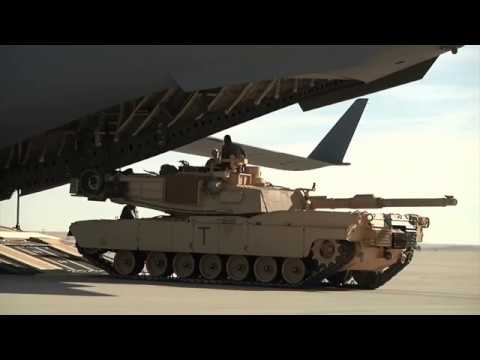 Loading Abrams tank onto C-17! Note to pilot: No inverted flight ...