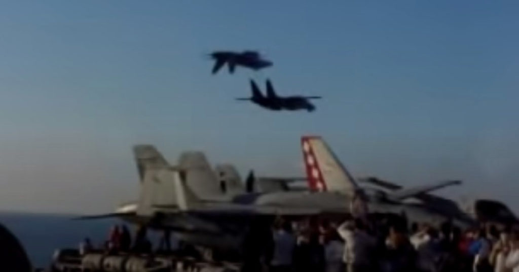 Inverted F/A-18 On Top Of F-14 Aircraft Carrier Flyby