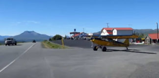 Plane Taking Off In Traffic In Alaska