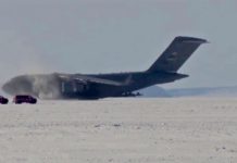 C-17 Globemaster III take off from deep snow runway at Phoenix Airfield, Antarctica