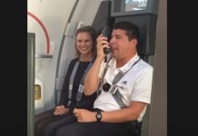 Flight Attendant Gives Instructions To Passengers As Looney Tunes Characters