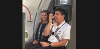 Flight Attendant Gives Instructions To Passengers As Looney Tunes Characters