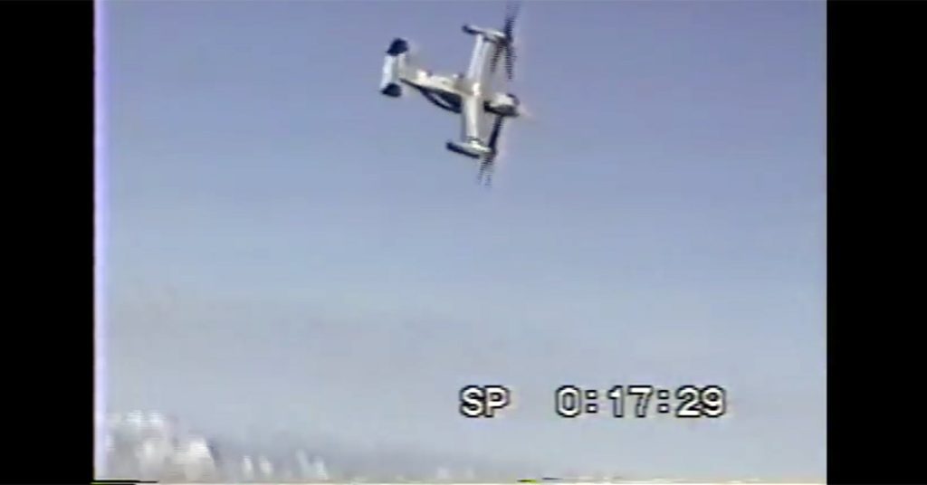 V-22 Osprey tilt-rotor aircraft conducting a complete 360-deg roll.