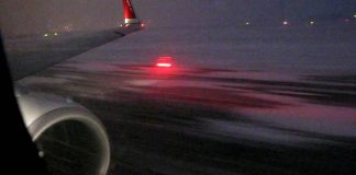 Boeing 737 Airplane Taking Off In Snowstorm Boeing 737 Airplane Taking Off In Snowstorm