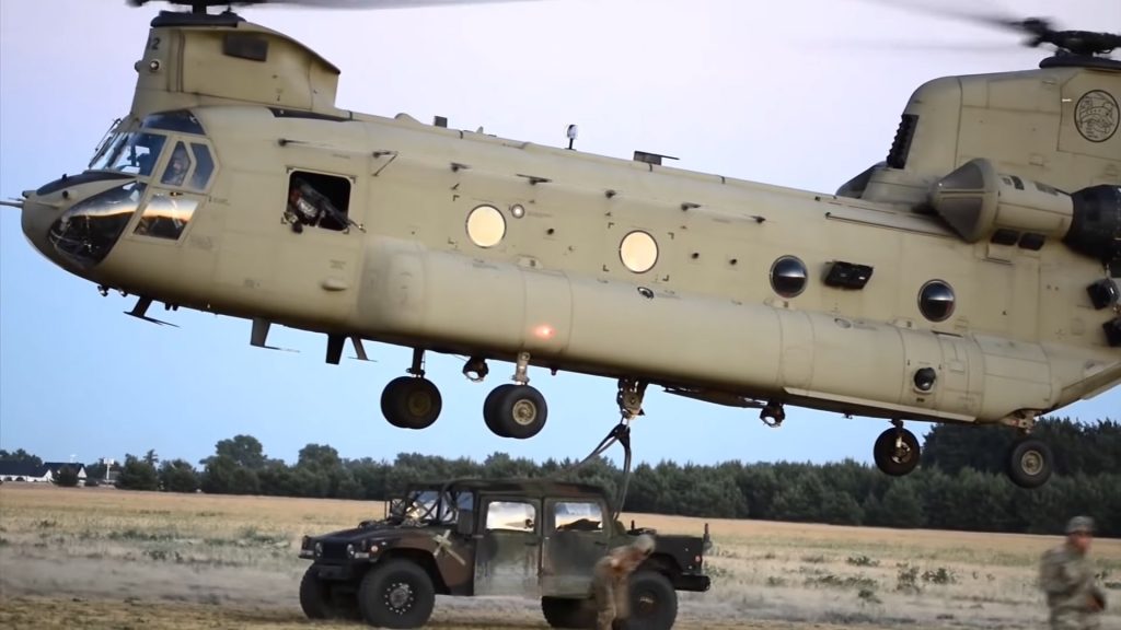 Boeing CH-47 Chinook Helicopter Lifting Humvee