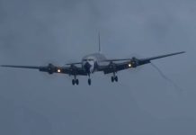 Douglas DC-7 at St Maarten with Crosswind Douglas DC-7 at St Maarten with Crosswind