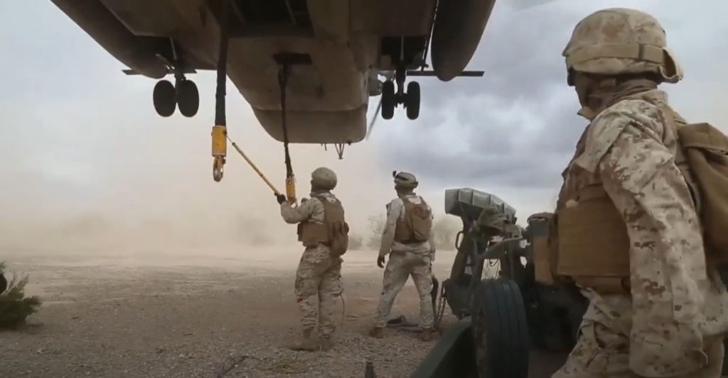 Sling Loading An M777 On a CH-53E Super Stallion Helicopter