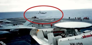 Rare Low Altitude Passes by Bomber Aircraft: A Spectacular Display of Power and Precision USAF B-52 below deck of an aircraft carrier